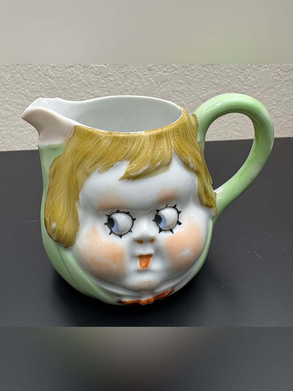 Vintage Hand-Painted Creamer with “peek-a-boo” Child’s Face with Googly Eyes.